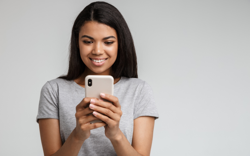 woman texting on phone 